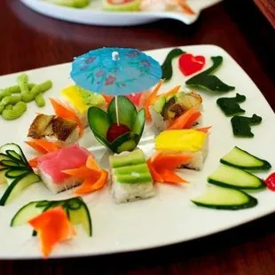 a plate of sushi on a table