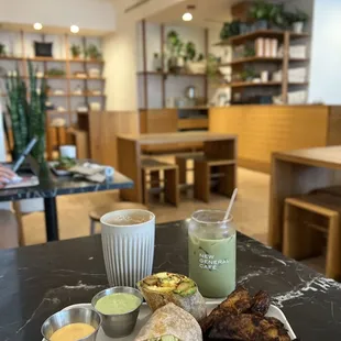 Breakfast burrito, latte, and iced matcha horchata latte