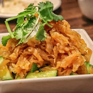 a bowl of asian food