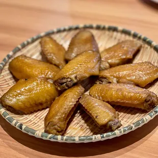 a plate of chicken wings