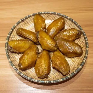 a plate of fried chicken wings