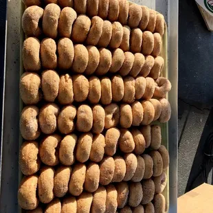a tray of freshly baked potatoes