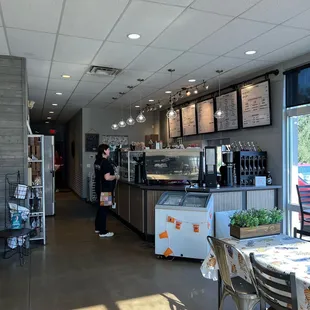 a woman standing at the counter
