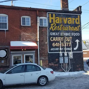 a car parked in front of it