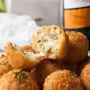 It's  crispy rissotto ball(hand made special rice ball with permenson cheese and mozzarella cheese in side)