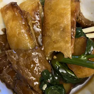 Beef chow fun with Chinese broccoli