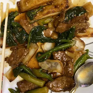 Beef chow fun with Chinese broccoli