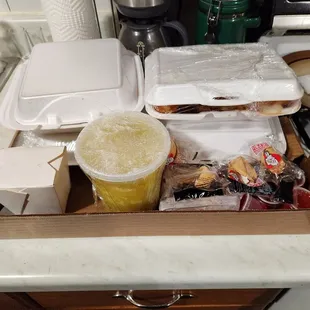 Organized tray of carryout food. The owner was sweet to give our food to us this way. Easier to carry.