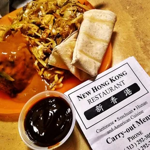 a plate of food and a menu