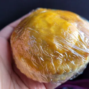 a piece of fruit wrapped in plastic