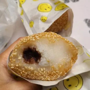 Sesame seed ball. Almost tennis-ball size but the paste inside is grape-like and not even centered. LOL, dear baker, you had one job bro.