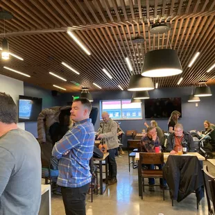 a group of people at a bar