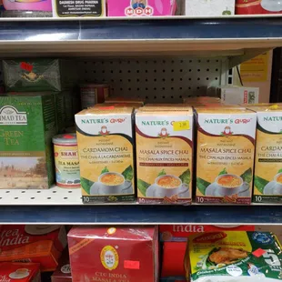 a variety of teas on a shelf