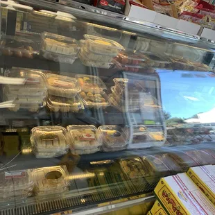 a display case full of baked goods