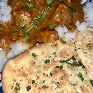First time making chicken tikka masala! Used the ingredients bought at this store! Garlic naan from frozen section!