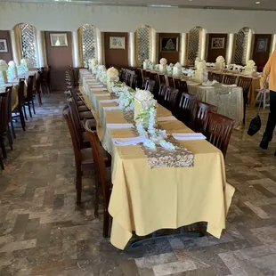 a long table set for a wedding reception