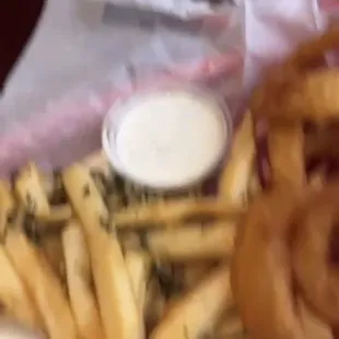The cheesesteak combo with garlic fries and onion rings!