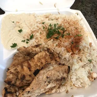 Lunch special, deboned chicken with hummus $10.99, with choice of rice or fries, and soup or salad, included garlic and pita. DELICIOUS!