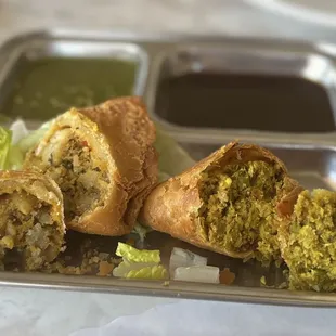 Our new MUST HAVES! Veg Samosa (left) Meat Samosa (right)