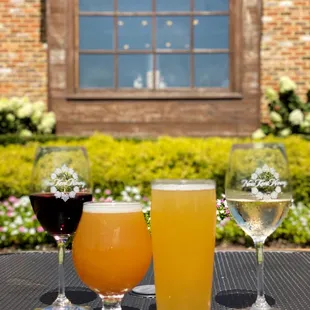 three glasses of wine and a glass of wine