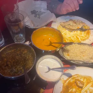 Chicken Saag, homemade yogurt, Paneer Makhani, basmati rice, Garlic Nan Bread and much more.. delicious!