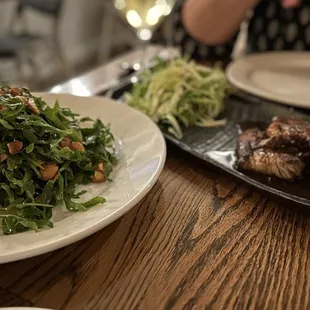 Arugula salad and pork belly