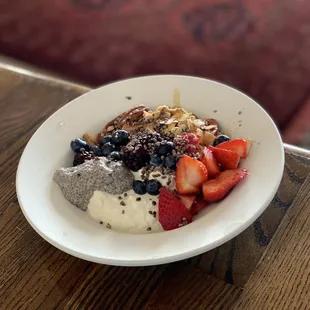 a bowl of fruit and yogurt