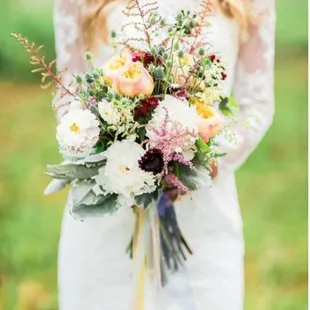 Boho bouquets mix large romantic flowers with dainty fillers and blooms for great texture and a disorganized feel!