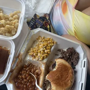Brisket sandwich with bbq beans and Mexican corn