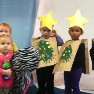 My son and his friends at the NLDS christmas recital. It was the cutest ever! Then they invited Santa to join in on the fun :-)
