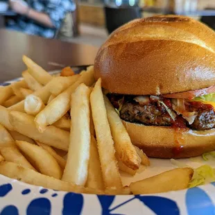 The 1/2-pound patty is standard, as is the brioche bun. Comes with fries.