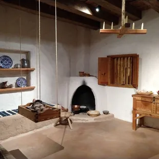 Model of colonial home.