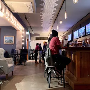 people sitting at the bar