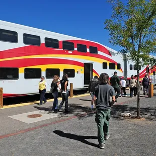 Passengers boarding the Rail Runner.