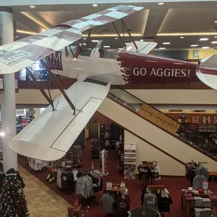 On the upward escalator.