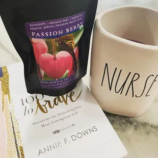 a cup of coffee and a packet of tea