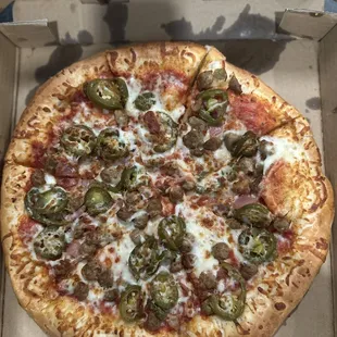 Jalapeño, Bacon and Sausage. Doughy pizza.