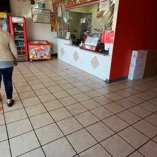 a woman walking through the store