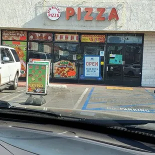 a view of the outside of a restaurant