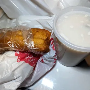 a cup of milk and a pastry