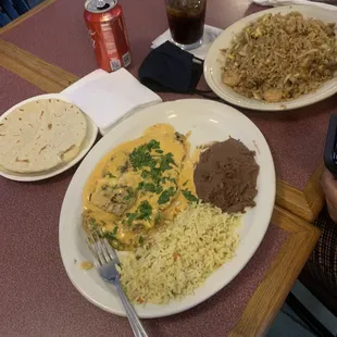 a plate of mexican food on a table