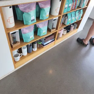 a woman standing in a coffee shop