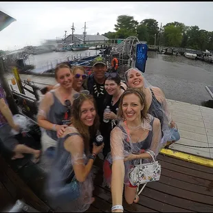 Whose afraid of little ol' bit of rain? Good look, ladies!