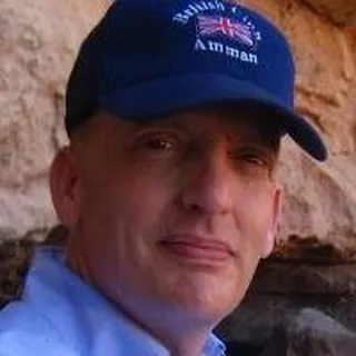 Greg K.
