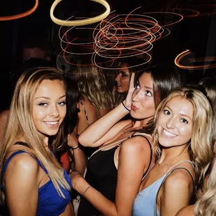 a group of girls posing for a picture