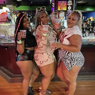 three women posing for a picture