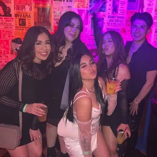 a group of women posing for a picture