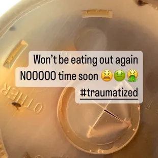 a close up of a plastic container with a message saying won't be eating out again noooo time