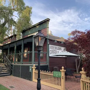 Exterior, patio dining on the right, indoor dining to the left