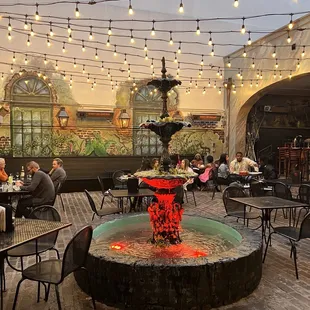 a fountain in a courtyard